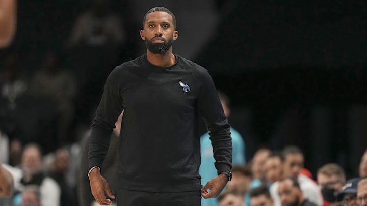 Dec 12, 2025; Charlotte, North Carolina, USA; Charlotte Hornets head coach Charles Lee looks on during the first quarter against the Chicago Bulls at Spectrum Center. Mandatory Credit: Jim Dedmon-Imagn Images