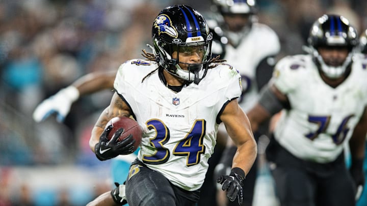 Baltimore Ravens running back Keaton Mitchell (34) runs the ball against the Jacksonville Jaguars in the fourth quarter at EverBank Stadium.