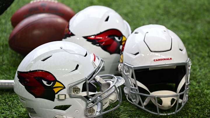Aug 26, 2023; Minneapolis, Minnesota, USA; Arizona Cardinals helmets sit ready for action against