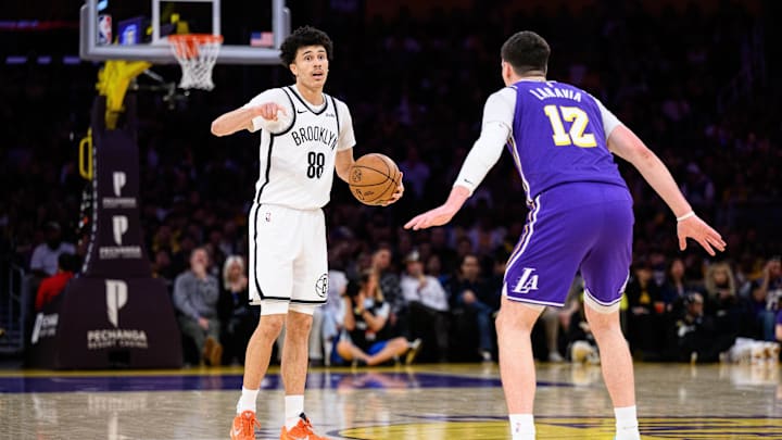 Mar 27, 2026; Los Angeles, California, USA; Brooklyn Nets guard Nolan Traore (88) calls a play against Los Angeles Lakers forward Jake LaRavia (12) during the first half at Crypto.com Arena. Mandatory Credit: William Liang-Imagn Images Mar 27, 2026; Los Angeles, California, USA; Brooklyn Nets guard Nolan Traore (88) calls a play against Los Angeles Lakers forward Jake LaRavia (12) during the first half at Crypto.com Arena. Mandatory Credit: William Liang-Imagn Images