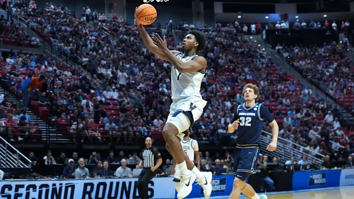 Mar 20, 2026; San Diego, CA, USA; Villanova Wildcats guard Malachi Palmer (7) shoots against the Utah State Aggies in the second half during a first round game of the men's 2026 NCAA Tournament at Viejas Arena. Mandatory Credit: Kirby Lee-Imagn Images