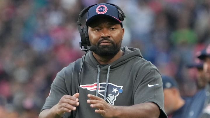 Oct 20, 2024; London, United Kingdom; New England Patriots coach Jerod Mayo watches from the sidelines against the New England Patriots in the second half of an NFL International Series game at Wembley Stadium.