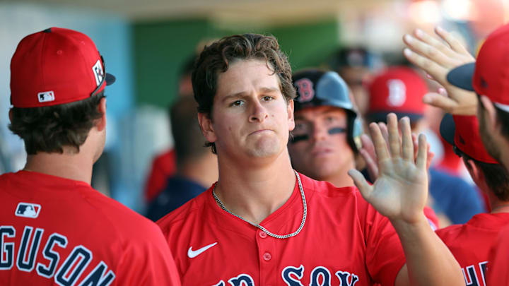 Feb 28, 2025; Clearwater, Florida, USA; Boston Red Sox outfielder Roman Anthony (48) is congratulated after he scored a run against the Philadelphia Phillies during the third inning at BayCare Ballpark. Mandatory Credit: Kim Klement Neitzel-Imagn Images Feb 28, 2025; Clearwater, Florida, USA; Boston Red Sox outfielder Roman Anthony (48) is congratulated after he scored a run against the Philadelphia Phillies during the third inning at BayCare Ballpark. Mandatory Credit: Kim Klement Neitzel-Imagn Images
