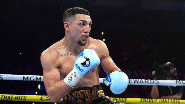 Feb 8, 2024; Las Vegas, Nevada, USA;  Teofimo Lopez (black/gold/red trunks) and Jamaine Ortiz (black trunks) box during their WBO Junior Welterweight World Title bout at Michelob ULTRA Arena. Mandatory Credit: Joe Camporeale-Imagn Images