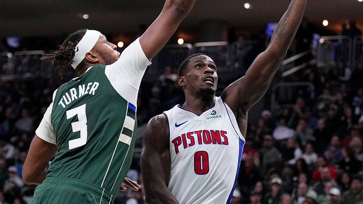 Nov 22, 2025; Milwaukee, Wisconsin, USA; Detroit Pistons center Jalen Duren (0) puts up a shot against Milwaukee Bucks center/forward Myles Turner (3) in the second half at Fiserv Forum. Mandatory Credit: Michael McLoone-Imagn Images