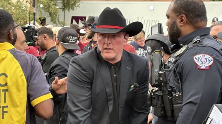 ESPN's Pat McAfee arrives on the set of College GameDay in Norman on Saturday.