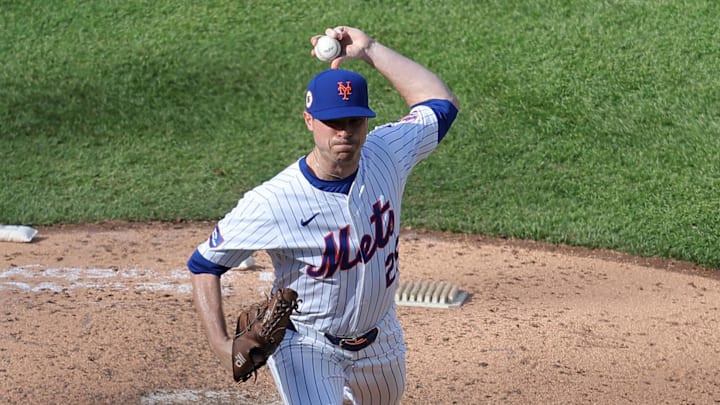 Apr 14, 2024; New York City, New York, USA; New York Mets relief pitcher Brooks Raley (25) pitches against the Kansas City Royals during the eighth inning at Citi Field. Mandatory Credit: Brad Penner-Imagn Images
