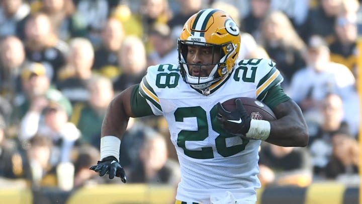 Nov 12, 2023; Pittsburgh, Pennsylvania, USA; Green Bay Packers running back AJ Dillon (28) moves the