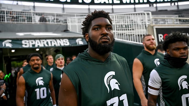 Michigan State's Kristian Phillips and the Spartans take the field for warm ups before the game against Florida Atlantic on Friday, Aug. 30, 2024, at Spartan Stadium in East Lansing. Michigan State's Kristian Phillips and the Spartans take the field for warm ups before the game against Florida Atlantic on Friday, Aug. 30, 2024, at Spartan Stadium in East Lansing.