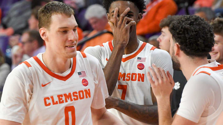 Clemson forward Chauncey Wiggins (7) interacts with Clemson sophomore center Viktor Lakhin (0) after he made a three point shot against Radford during the second half at Littlejohn Coliseum Thursday, November 21, 2024; Clemson, SC, USA.