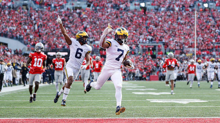 Michigan running back Donovan Edwards runs for a touchdown against Ohio State. Michigan running back Donovan Edwards runs for a touchdown against Ohio State.
