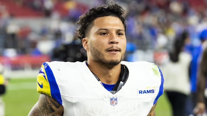 Dec 7, 2025; Glendale, Arizona, USA; Los Angeles Rams running back Blake Corum (22) against the Arizona Cardinals at State Farm Stadium. Mandatory Credit: Mark J. Rebilas-Imagn Images Dec 7, 2025; Glendale, Arizona, USA; Los Angeles Rams running back Blake Corum (22) against the Arizona Cardinals at State Farm Stadium. Mandatory Credit: Mark J. Rebilas-Imagn Images