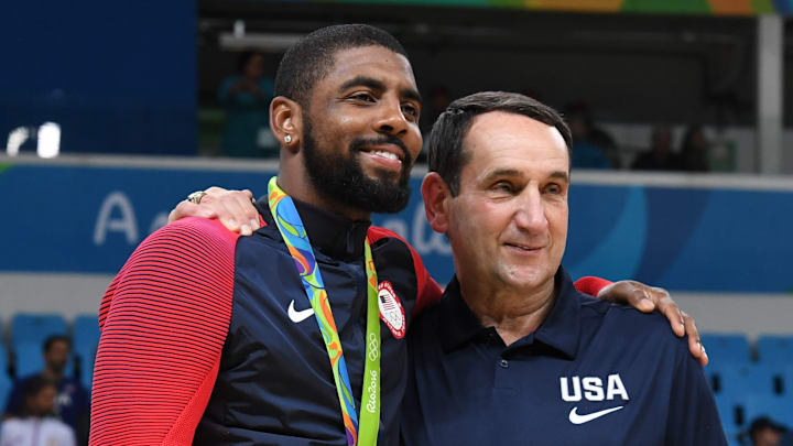 Former Duke basketball player Kyrie Irving and head coach Mike Krzyzewski