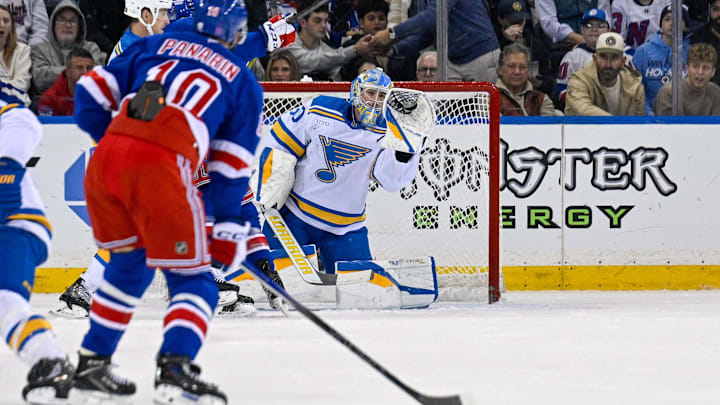 Nov 24, 2025; New York, New York, USA; St. Louis Blues goaltender Joel Hofer (30) makes a glove save against the New York Rangers during the first period at Madison Square Garden. Mandatory Credit: Dennis Schneidler-Imagn Images Nov 24, 2025; New York, New York, USA; St. Louis Blues goaltender Joel Hofer (30) makes a glove save against the New York Rangers during the first period at Madison Square Garden. Mandatory Credit: Dennis Schneidler-Imagn Images