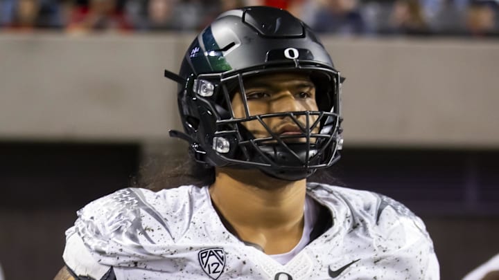 Oct 8, 2022; Tucson, Arizona, USA; Oregon Ducks offensive lineman Malaesala Aumavae-Laulu (71) against the Arizona Wildcats at Arizona Stadium. Mandatory Credit: Mark J. Rebilas-Imagn Images
