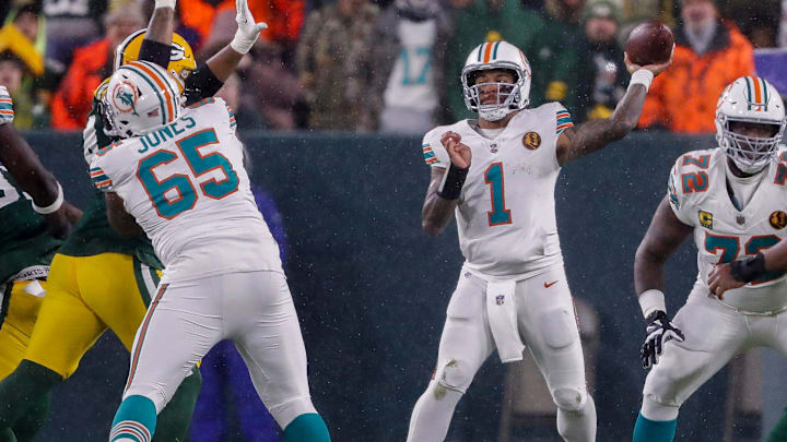 Miami Dolphins quarterback Tua Tagovailoa (1) passes the ball against the Green Bay Packers on Thursday, November 28, 2024, at Lambeau Field in Green Bay, Wis. The Packers won the game, 30-17. Miami Dolphins quarterback Tua Tagovailoa (1) passes the ball against the Green Bay Packers on Thursday, November 28, 2024, at Lambeau Field in Green Bay, Wis. The Packers won the game, 30-17.