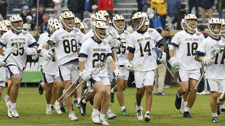 May 23, 2026; Charlottesville, VA, USA; Notre Dame Fighting Irish players celebrate after their game against the Syracuse Orange in a semifinal of the NCAA Mens Lacrosse Championship at Scott Stadium. May 23, 2026; Charlottesville, VA, USA; Notre Dame Fighting Irish players celebrate after their game against the Syracuse Orange in a semifinal of the NCAA Mens Lacrosse Championship at Scott Stadium.