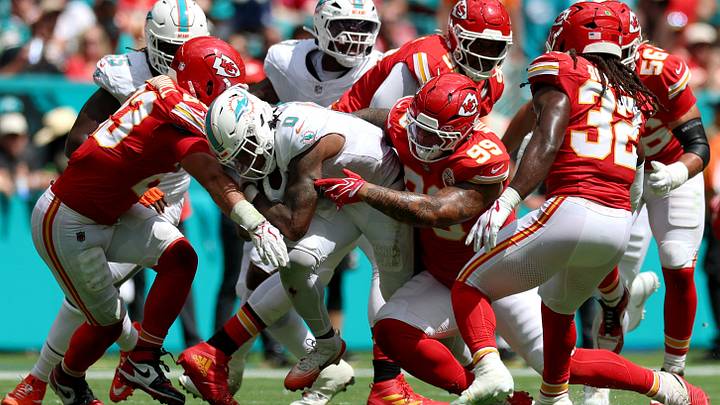 Sep 27, 2026; Miami Gardens, Florida, USA; Kansas City Chiefs defensive line Peter Woods (99) tackles Miami Dolphins running back Ollie Gordon II (0) during the second quarter at Hard Rock Stadium. Mandatory Credit: Nathan Ray Seebeck-Imagn Images Sep 27, 2026; Miami Gardens, Florida, USA; Kansas City Chiefs defensive line Peter Woods (99) tackles Miami Dolphins running back Ollie Gordon II (0) during the second quarter at Hard Rock Stadium. Mandatory Credit: Nathan Ray Seebeck-Imagn Images