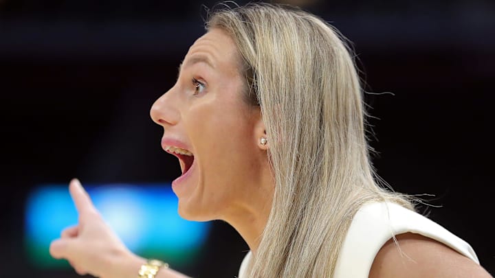 Buffalo Bulls head coach Becky Burke works the sideline during the first half of the Mid-American Conference Tournament women's championship game at Rocket Mortgage FieldHouse, Saturday, March 16, 2024, in Cleveland, Ohio. Buffalo Bulls head coach Becky Burke works the sideline during the first half of the Mid-American Conference Tournament women's championship game at Rocket Mortgage FieldHouse, Saturday, March 16, 2024, in Cleveland, Ohio.