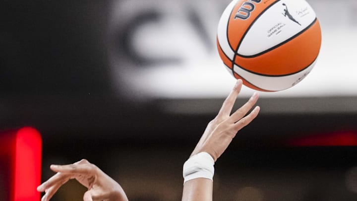 Jun 26, 2025; Indianapolis, Indiana, USA; The Indiana Fever and the Los Angeles Sparks go for the ball at tipoff  at Gainbridge Fieldhouse. Mandatory Credit: Grace Smith/INDIANAPOLIS STAR-Imagn Images