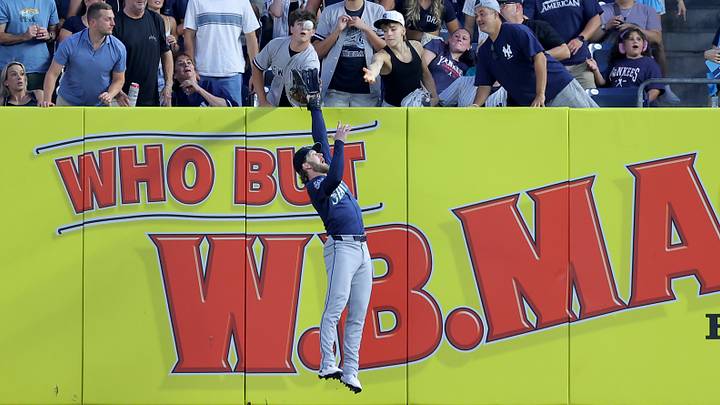 Aug 11, 2026; Bronx, New York, USA; Seattle Mariners right fielder Taylor Ward (27) catches a fly ball by New York Yankees third baseman Ryan McMahon (not pictured) during the second inning at Yankee Stadium. Mandatory Credit: Brad Penner-Imagn Images Aug 11, 2026; Bronx, New York, USA; Seattle Mariners right fielder Taylor Ward (27) catches a fly ball by New York Yankees third baseman Ryan McMahon (not pictured) during the second inning at Yankee Stadium. Mandatory Credit: Brad Penner-Imagn Images