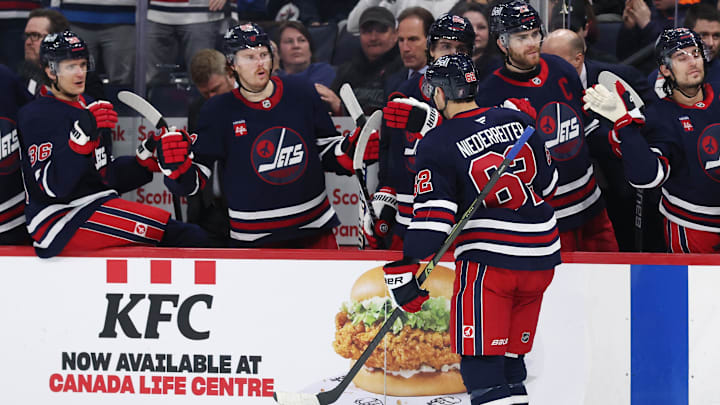 Mar 23, 2025; Winnipeg, Manitoba, CAN; Winnipeg Jets right wing Nino Niederreiter (62) celebrates after a goal against the Buffalo Sabres in the second period at Canada Life Centre. Mandatory Credit: James Carey Lauder-Imagn Images