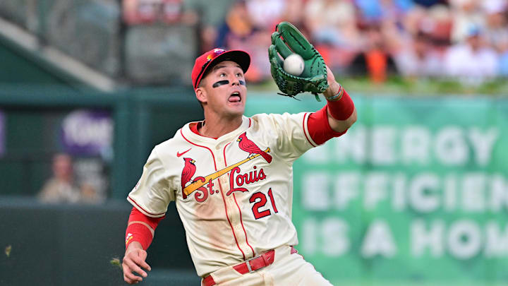 Sep 6, 2025; St. Louis, Missouri, USA; St. Louis Cardinals outfielder Lars Nootbaar (21) makes the catch on a fly ball to left field by San Francisco Giants catcher Patrick Bailey (14) in the second inning at Busch Stadium. Mandatory Credit: Tim Vizer-Imagn Images