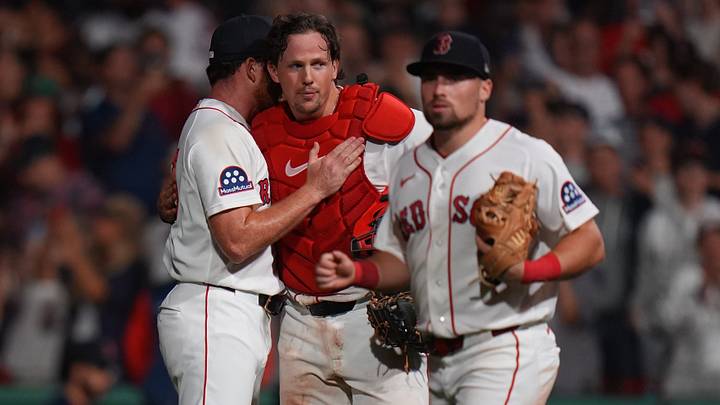 Aug 17, 2026; Boston, Massachusetts, USA; Boston Red Sox pitcher Wyatt Olds (75) and catcher Adley Rutschman (31) react after defeating the Arizona Diamondbacks in the ninth inning at Fenway Park. Mandatory Credit: David Butler II-Imagn Images