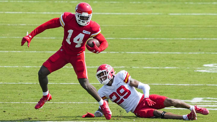 Aug 3, 2021; St. Joseph, Missouri, USA; Kansas City Chiefs wide receiver Cornell Powell (14) runs against cornerback BoPete Keyes (29) during training camp at Missouri Western State University. Mandatory Credit: Jay Biggerstaff-Imagn Images