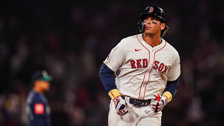 Apr 22, 2025; Boston, Massachusetts, USA; Boston Red Sox first base Triston Casas (36) hits a three run home run against the Seattle Mariners in the seventh inning at Fenway Park. Mandatory Credit: David Butler II-Imagn Images