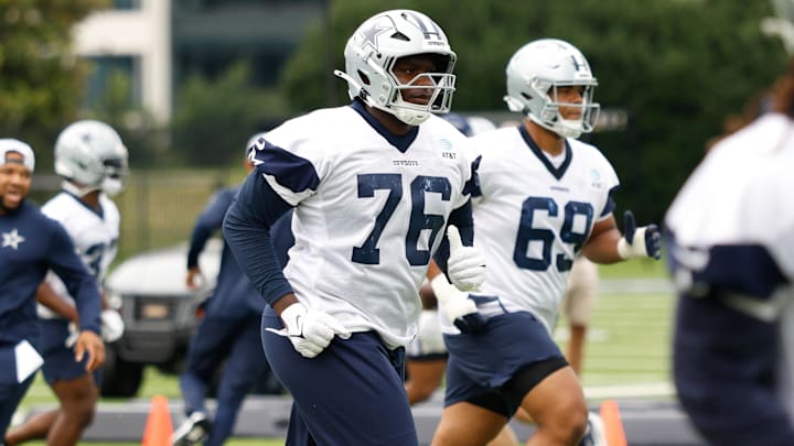 Dallas Cowboys offensive tackle Asim Richards goes through a drill during practice.