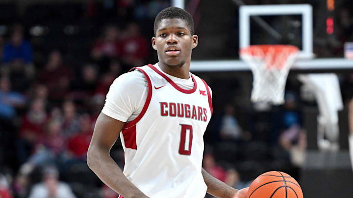 Nov 21, 2024; Spokane, Washington, USA; Washington State Cougars guard Cedric Coward (0) controls the ball against the Eastern Washington Eagles in the second half at Spokane Veterans Memorial Arena. Mandatory Credit: James Snook-Imagn Images Nov 21, 2024; Spokane, Washington, USA; Washington State Cougars guard Cedric Coward (0) controls the ball against the Eastern Washington Eagles in the second half at Spokane Veterans Memorial Arena. Mandatory Credit: James Snook-Imagn Images