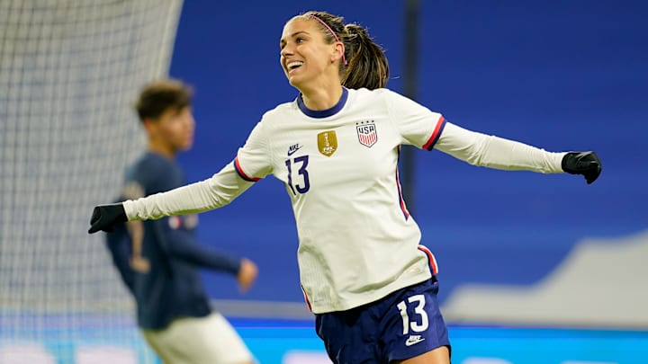 Alex Morgan celebrates goal. 