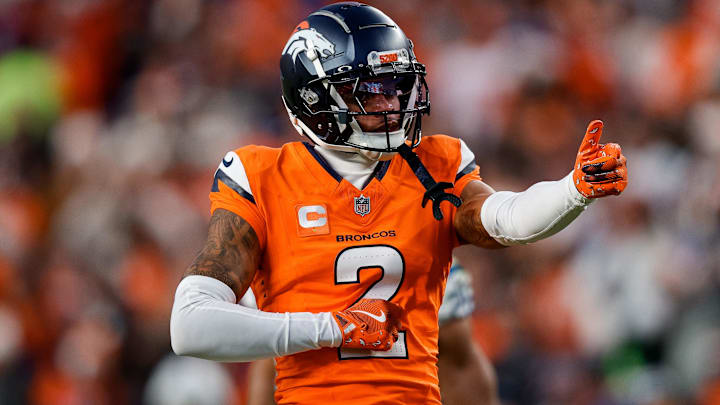 Dec 15, 2024; Denver, Colorado, USA; Denver Broncos cornerback Pat Surtain II (2) gestures after a play in the third quarter against the Indianapolis Colts at Empower Field at Mile High. 