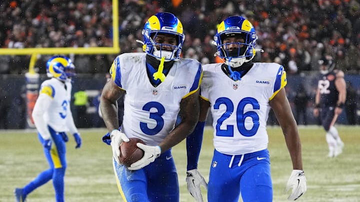 Jan 18, 2026; Chicago, IL, USA; Los Angeles Rams safety Kam Curl (3) celebrates with safety Kamren Kinchens (26) after intercepting a pass intended for Chicago Bears wide receiver DJ Moore (not pictured) during overtime of an NFC Divisional Round game at Soldier Field. Mandatory Credit: David Banks-Imagn Images