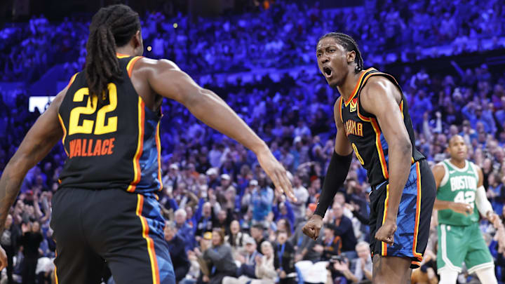 Jan 5, 2025; Oklahoma City, Oklahoma, USA; Oklahoma City Thunder guard Cason Wallace (22) and Oklahoma City Thunder forward Jalen Williams (8) celebrate after Cason scores against the Boston Celtics during the fourth quarter at Paycom Center. Mandatory Credit: Alonzo Adams-Imagn Images Jan 5, 2025; Oklahoma City, Oklahoma, USA; Oklahoma City Thunder guard Cason Wallace (22) and Oklahoma City Thunder forward Jalen Williams (8) celebrate after Cason scores against the Boston Celtics during the fourth quarter at Paycom Center. Mandatory Credit: Alonzo Adams-Imagn Images