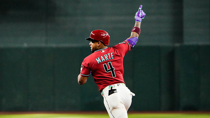 Apr 5, 2026; Phoenix, Arizona, USA; Arizona Diamondbacks second baseman Ketel Marte (4) celebrates his two run home run against the Atlanta Braves  during the tenth inning at Chase Field. 