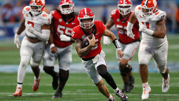Georgia quarterback Carson Beck (15) runs the ball during the second half of the NCAA Aflac Kickoff Game against Clemson in Atlanta, on Saturday, Aug. 31, 2024.