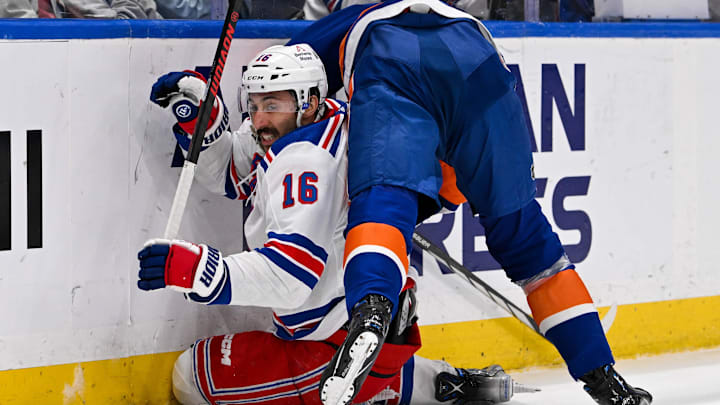 Apr 9, 2024; Elmont, New York, USA; New York Islanders defenseman Noah Dobson (8) checks New York