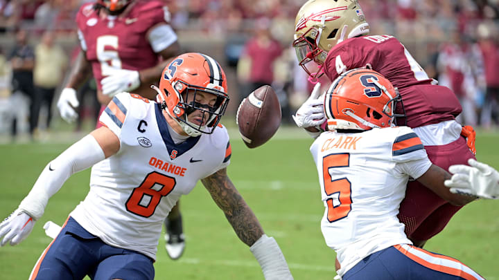 Florida State Seminoles wide receiver Keon Coleman fumbles the ball as he is hit by Syracuse Orange safety Alijah Clark Florida State Seminoles wide receiver Keon Coleman fumbles the ball as he is hit by Syracuse Orange safety Alijah Clark