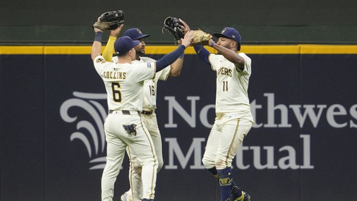 Sep 18, 2025; Milwaukee, Wisconsin, USA; Milwaukee Brewers outfielder Isaac Collins (6) Milwaukee Brewers outfielder Blake Perkins (16) and Milwaukee Brewers outfielder Jackson Chourio (11) celebrate a 5-2 win over the Los Angeles Angels at American Family Field. Mandatory Credit: Michael McLoone-Imagn Images Sep 18, 2025; Milwaukee, Wisconsin, USA; Milwaukee Brewers outfielder Isaac Collins (6) Milwaukee Brewers outfielder Blake Perkins (16) and Milwaukee Brewers outfielder Jackson Chourio (11) celebrate a 5-2 win over the Los Angeles Angels at American Family Field. Mandatory Credit: Michael McLoone-Imagn Images