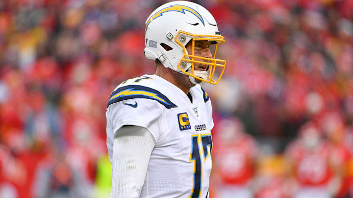 Dec 29, 2019; Kansas City, Missouri, USA; Los Angeles Chargers quarterback Philip Rivers (17) warms up on the sidelines during the game against the Kansas City Chiefs at Arrowhead Stadium. Mandatory Credit: Denny Medley-Imagn Images