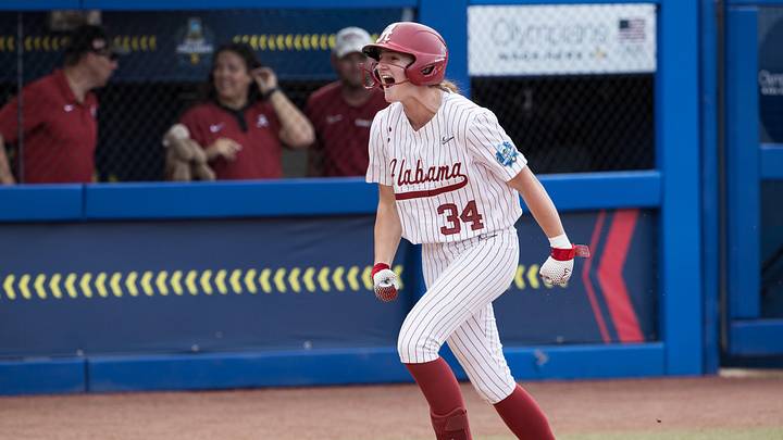 May 30, 2026; Oklahoma City, OK, USA;  Alabama Crimson Tide catcher Marlie Giles (34) yells as she runs towards home plate after a three-run home run in the first inning against the Nebraska Cornhuskers during the NCAA Women’s College World Series at Devon Park.
