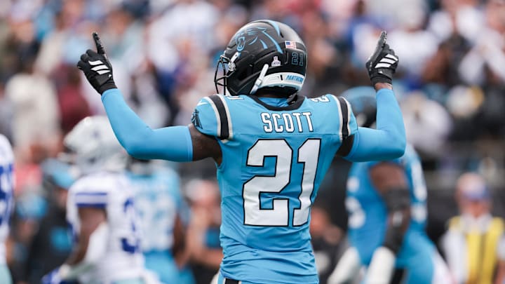 Oct 12, 2025; Charlotte, North Carolina, USA; Carolina Panthers safety Nick Scott (21) reacts after a play during the second half against the Dallas Cowboys at Bank of America Stadium. Mandatory Credit: Scott Kinser-Imagn Images Oct 12, 2025; Charlotte, North Carolina, USA; Carolina Panthers safety Nick Scott (21) reacts after a play during the second half against the Dallas Cowboys at Bank of America Stadium. Mandatory Credit: Scott Kinser-Imagn Images