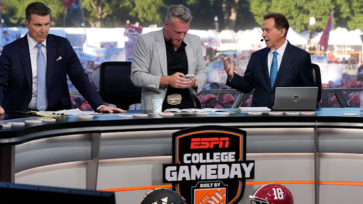 Oct. 4, 2025; Tuscaloosa, Alabama, USA; Rece Davis, Pat McAfee and Nick Saban interact on the set of ESPN’s College GameDay on location on the Quad at the University of Alabama before the Alabama versus Vanderbilt game.