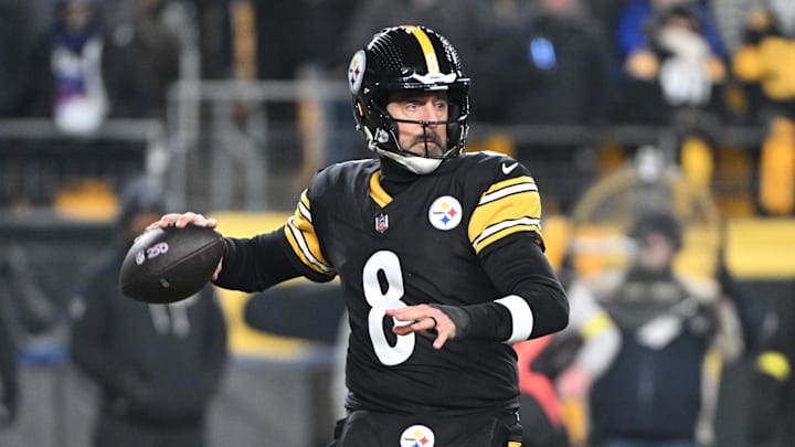 Pittsburgh Steelers quarterback Aaron Rodgers (8) drops back to pass against the Baltimore Ravens during the first half at Acrisure Stadium. Pittsburgh Steelers quarterback Aaron Rodgers (8) drops back to pass against the Baltimore Ravens during the first half at Acrisure Stadium.