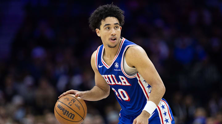 Dec 4, 2024; Philadelphia, Pennsylvania, USA; Philadelphia 76ers guard Jared McCain (20) controls the ball against the Orlando Magic during the fourth quarter at Wells Fargo Center. Mandatory Credit: Bill Streicher-Imagn Images