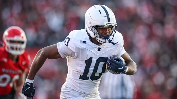 Penn State Nittany Lions running back Nicholas Singleton (10) carries the ball against the Rutgers Scarlet Knights during the first half at SHI Stadium. 