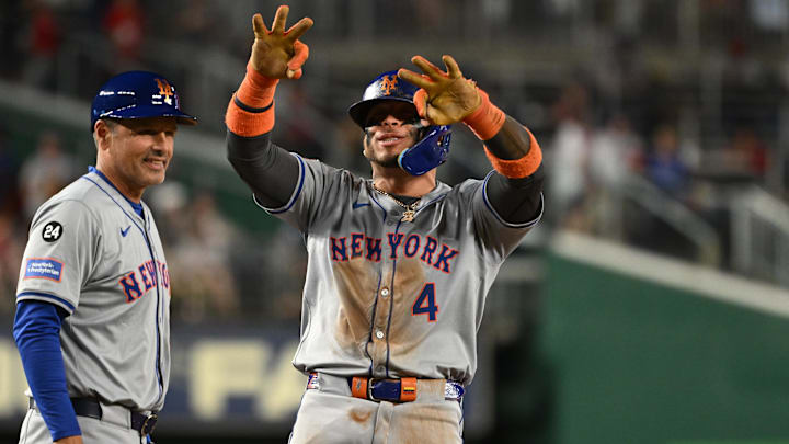 Jul 1, 2024; Washington, District of Columbia, USA; New York Mets catcher Francisco Alvarez (4) celebrates at third base after hitting a triple against the Washington Nationals during the tenth inning at Nationals Park. Mandatory Credit: Rafael Suanes-USA TODAY Sports