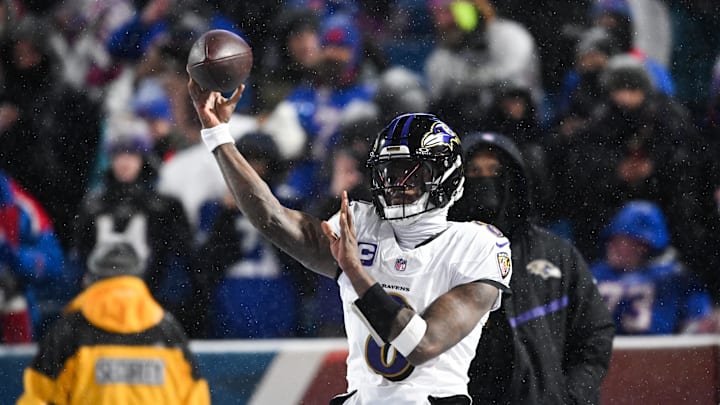Jan 19, 2025; Orchard Park, New York, USA; Baltimore Ravens quarterback Lamar Jackson (8) throws the ball during warm ups before the game against the Buffalo Bills in a 2025 AFC divisional round game at Highmark Stadium. Mandatory Credit: Mark Konezny-Imagn Images Jan 19, 2025; Orchard Park, New York, USA; Baltimore Ravens quarterback Lamar Jackson (8) throws the ball during warm ups before the game against the Buffalo Bills in a 2025 AFC divisional round game at Highmark Stadium. Mandatory Credit: Mark Konezny-Imagn Images